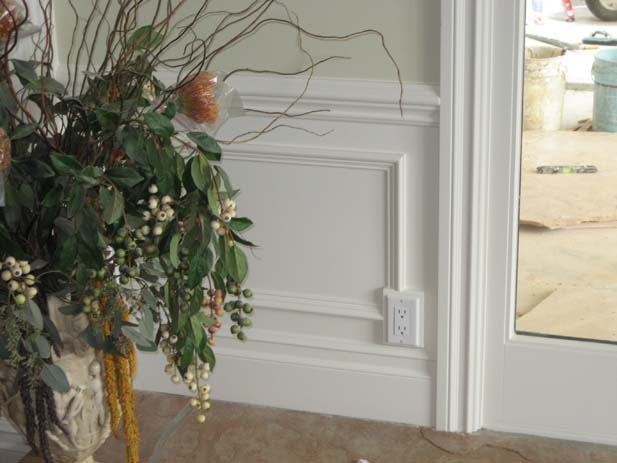 wainscotting and coffered ceilings