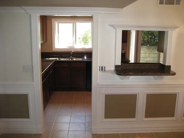 wainscotting and coffered ceilings